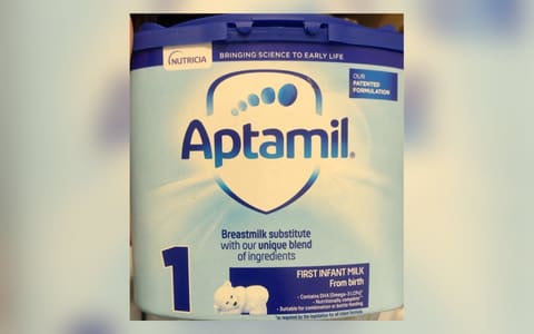 A tub of Aptamil 1 First Infant Milk powder