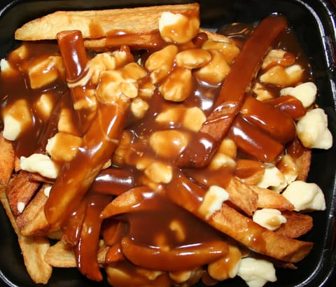 Poutine fries with cheese curds and gravy