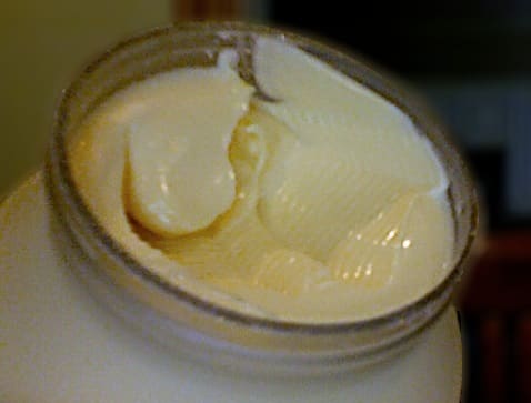 Open jar of mayonnaise (product-neutral)