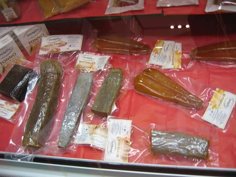 Cured bottarga fish roe (product packaging visible)