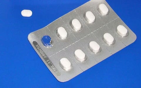 Film-coated tablets in a blister pack, the main use of E1205-type coatings
