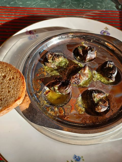 Escargot cooked in garlic butter