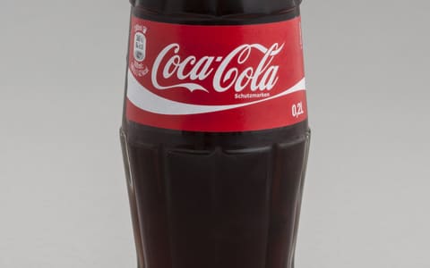A glass bottle of Coca-Cola
