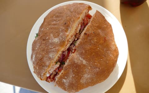 A Maltese ftira loaf filled with tuna, served in Malta
