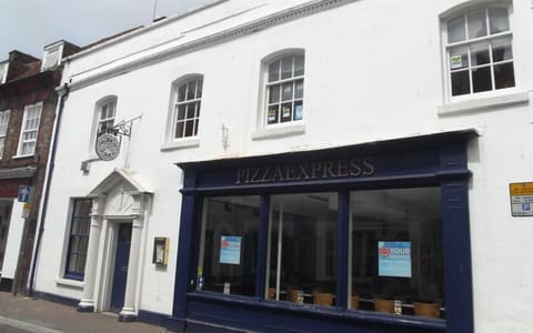 A Pizza Express restaurant front on the High Street in Poole, Dorset
