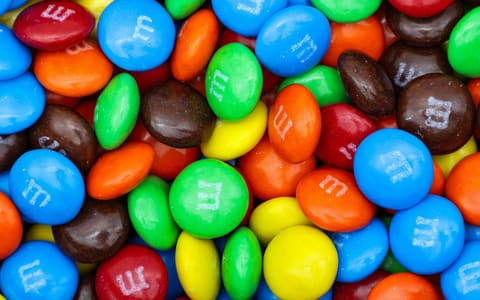 Brightly coloured sugar-shelled chocolates (M&M's)