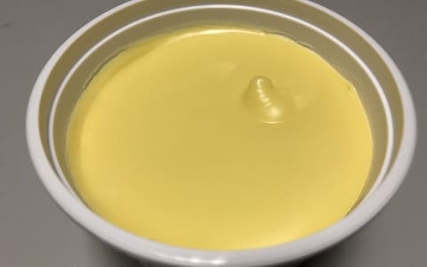 An opened tub of margarine