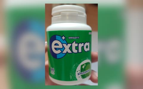A bottle of Wrigley's Extra Spearmint chewing gum
