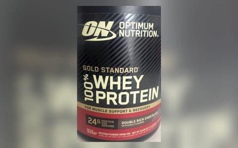 A tub of Optimum Nutrition Gold Standard 100% Whey Protein, Double Rich Chocolate