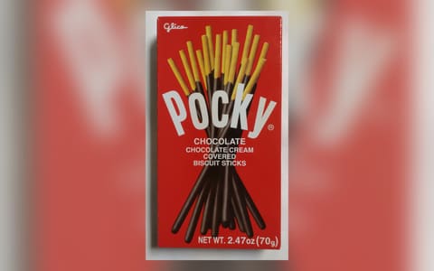 A red US box of Glico Pocky Chocolate, chocolate cream covered biscuit sticks, 70 g