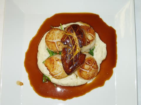 Pan-seared scallops on a plate