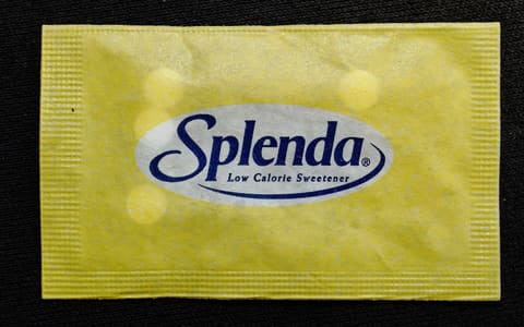 A yellow Splenda packet; Splenda’s sweetener is sucralose