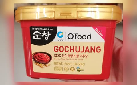 A 500 g tub of O'Food gochujang brown rice red pepper paste